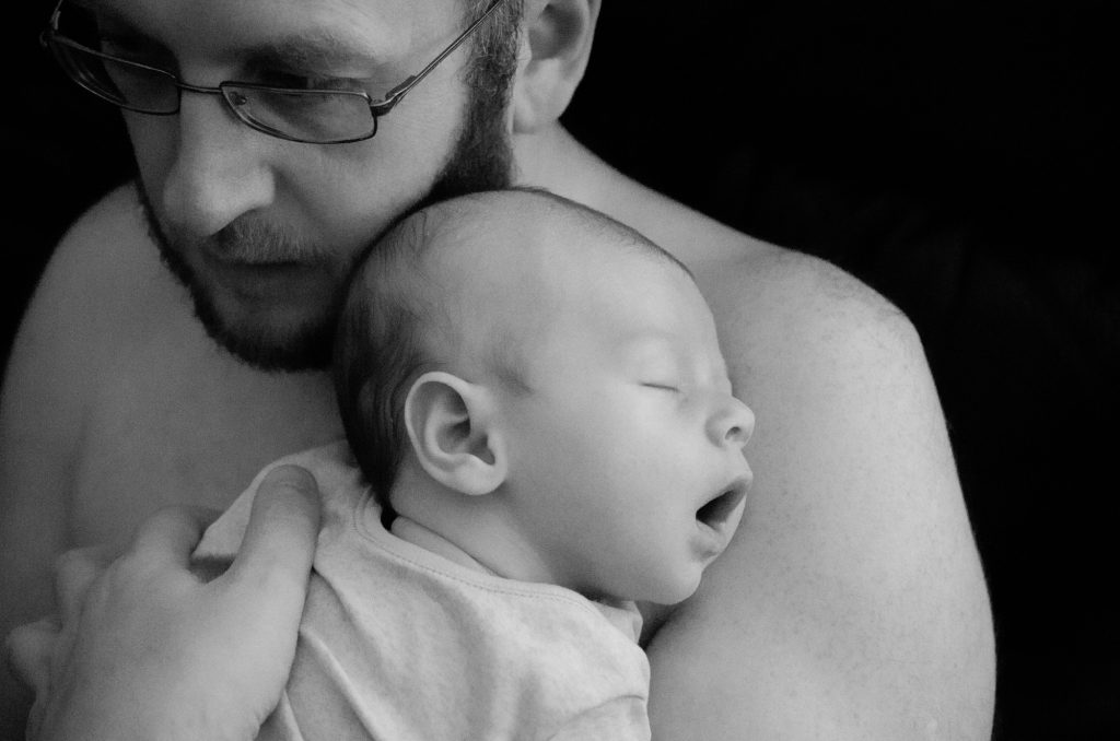 Jonah sleeping in Martin's arms