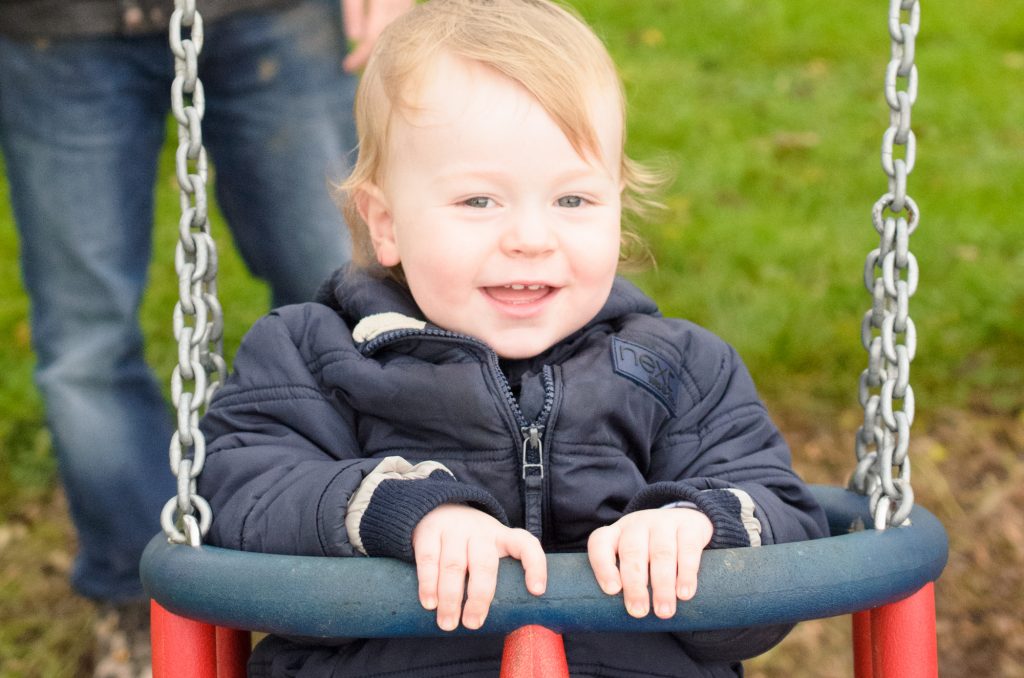 Jonah enjoying the swings at Birchfield Farm Pumpkin Festival