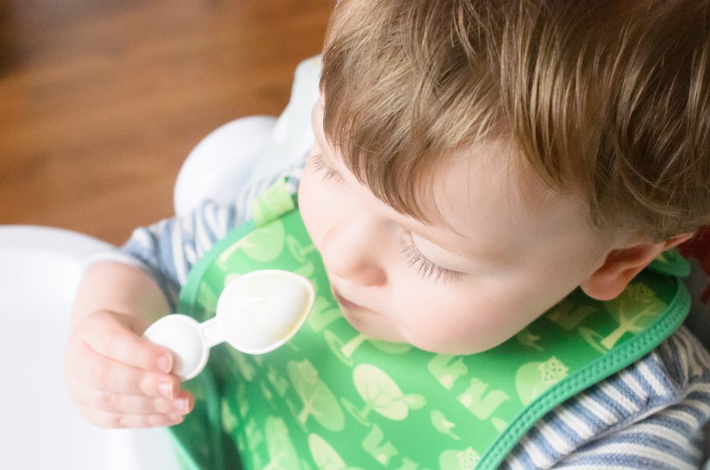 Jonah trying Wellbaby vitamins