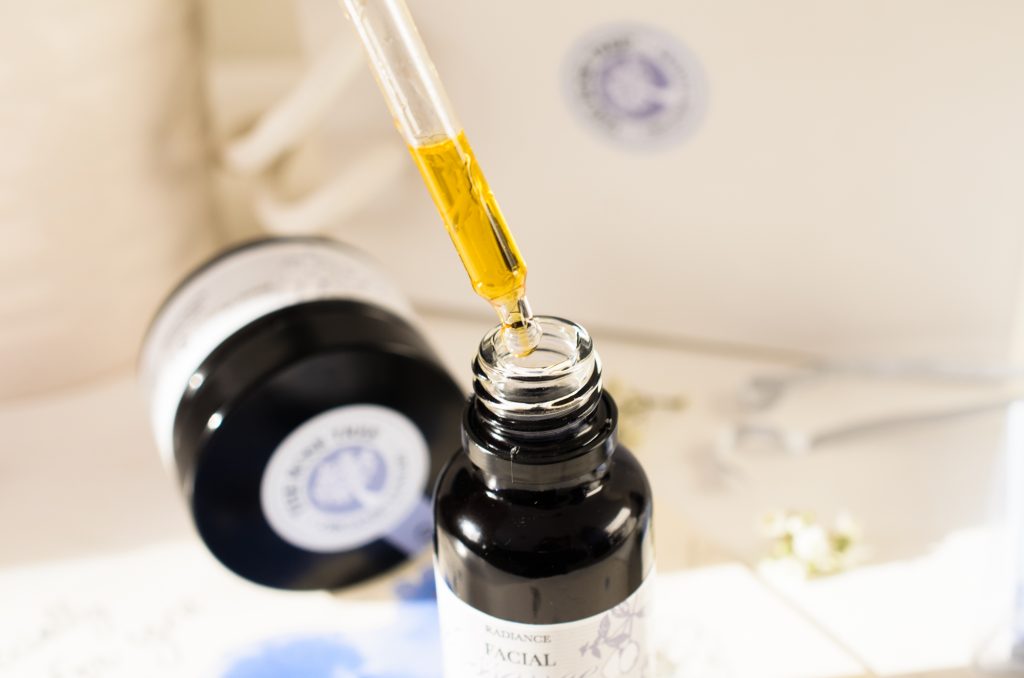 Golden facial essence in the dropper