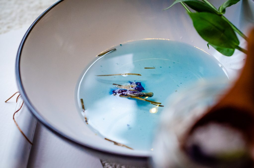 The blue colour of the salt infusion once mixed with water