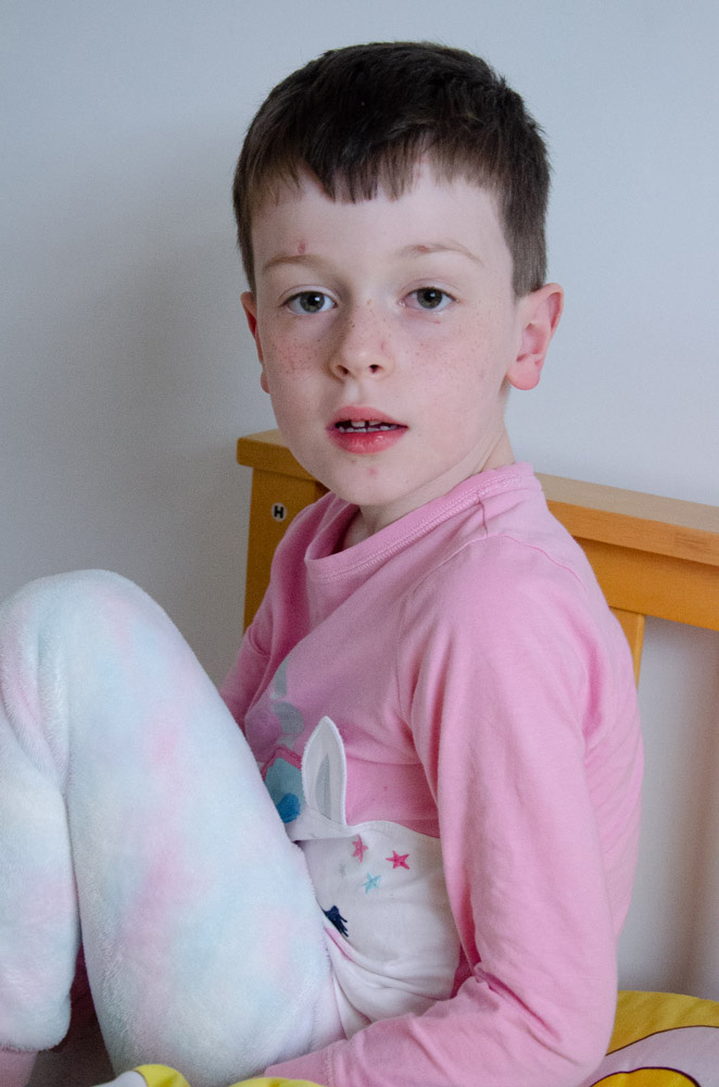 Jonah dressed in Cara's pyjamas