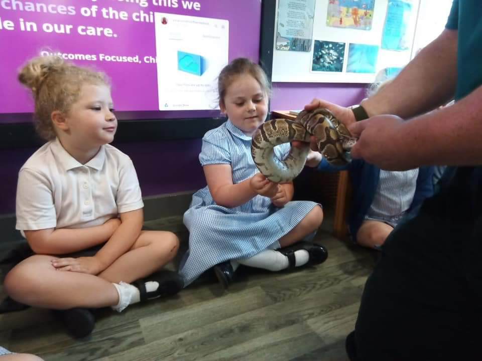 Cara holding a snake