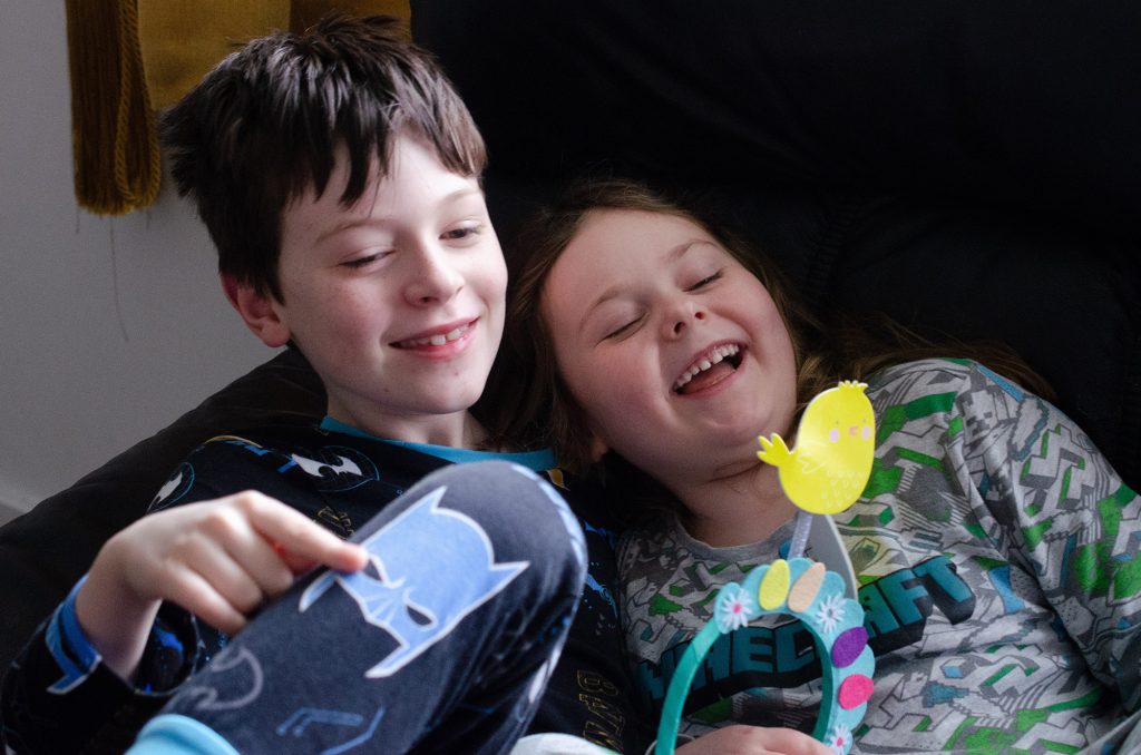 Jonah and Cara on the sofa