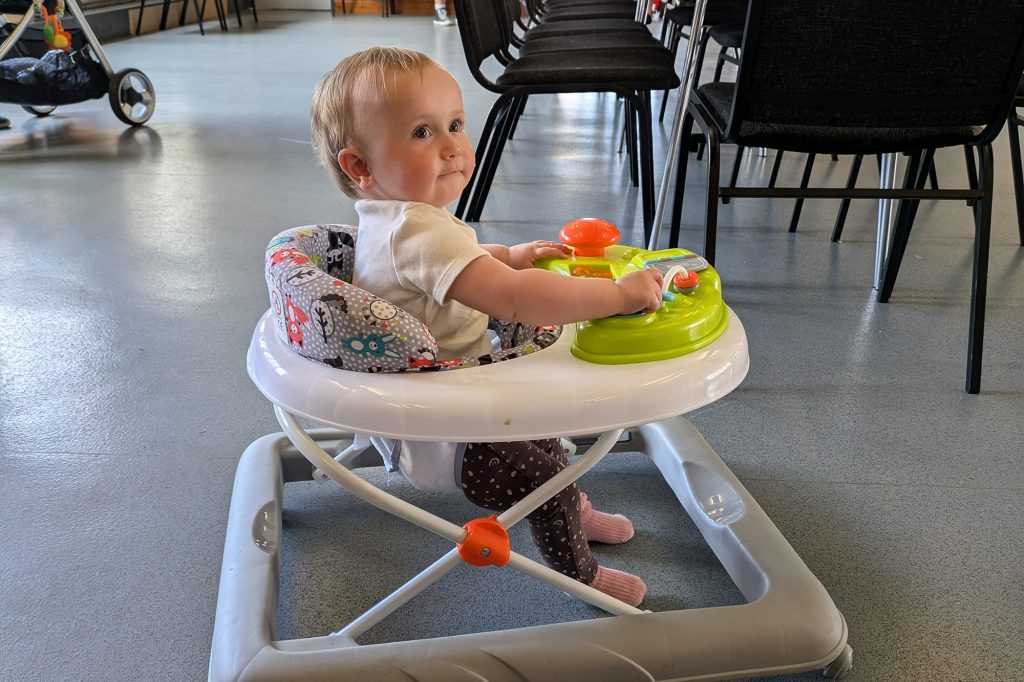 Eleanor at playgroup in the baby walker