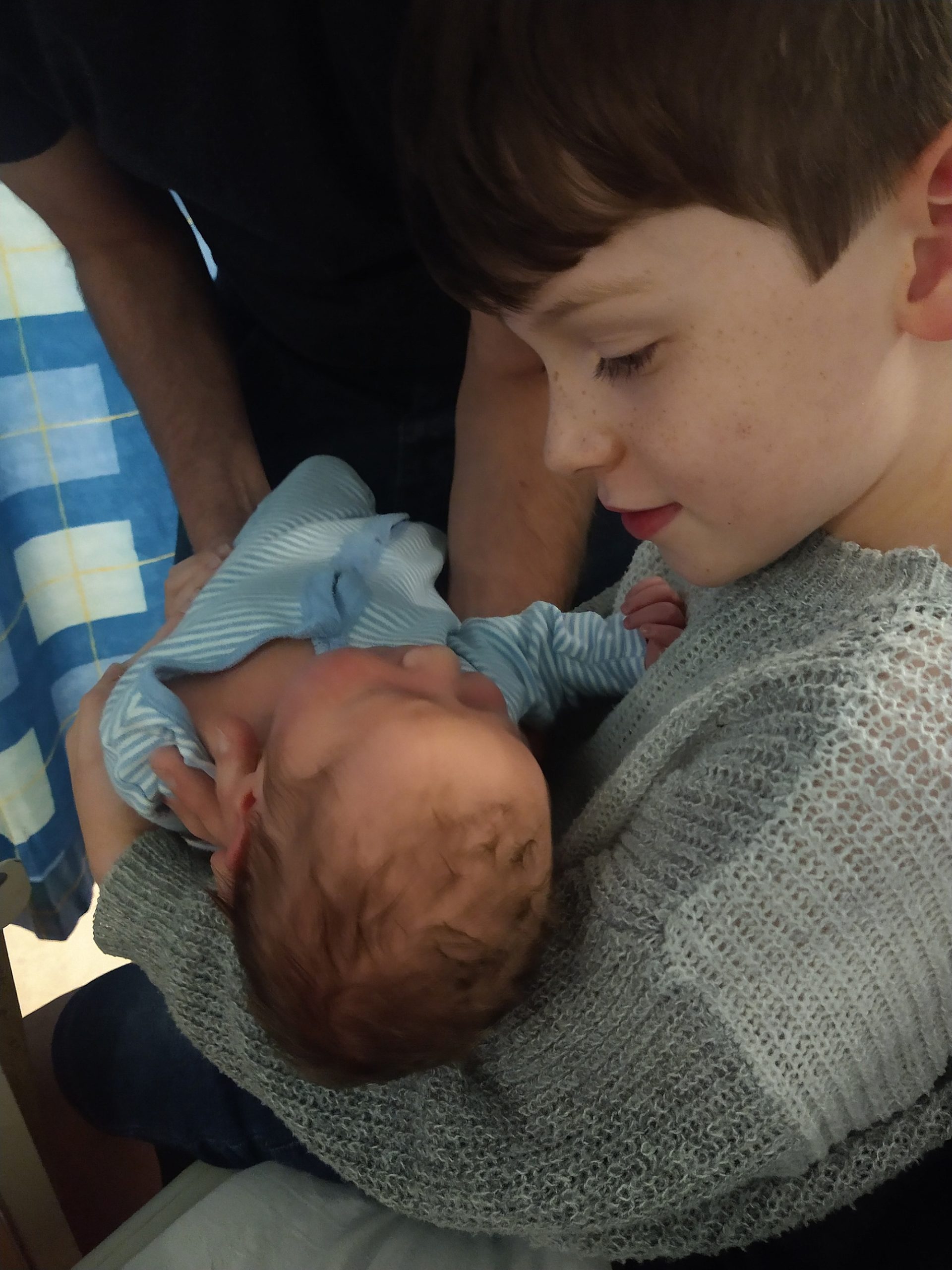 Loving on your baby sister!
