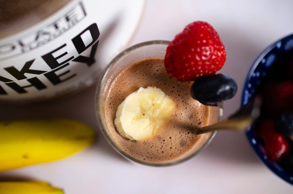 The Naked Whey Protein Powder in a chocolate smoothie with fruit
